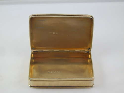 A rare George III silver gilt table snuff box. Alex. Strachan 1812