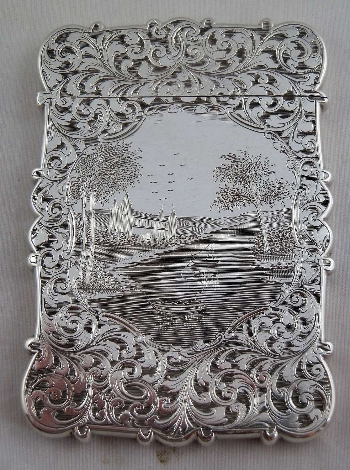 A Victorian engraved silver card case, Nathaniel Mills