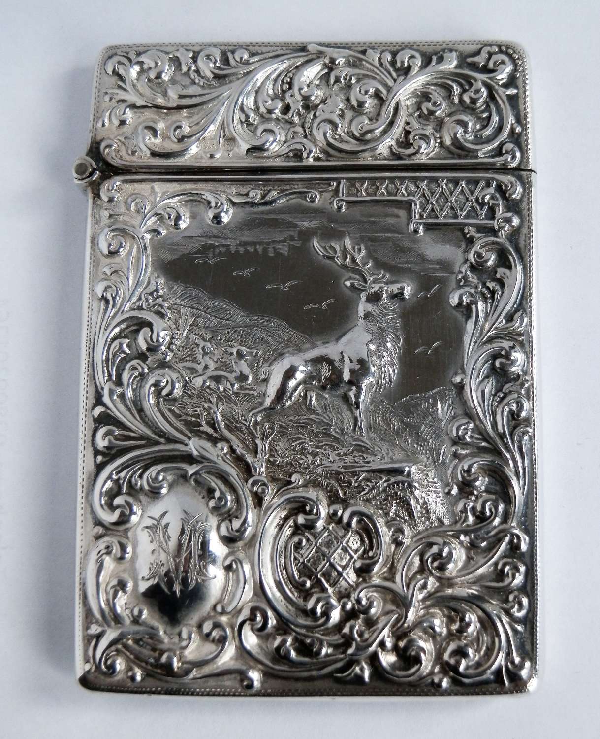 An Edwardian silver card case with a stag, 1904