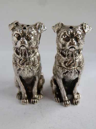 A beautiful pair of dog condiments,2005