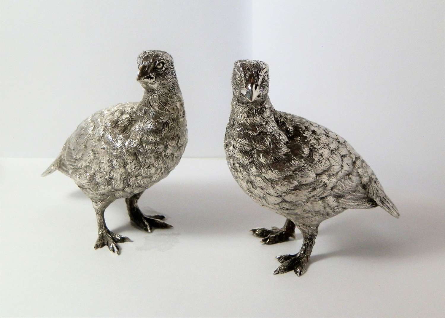 A pair of silver Quails by Tessiers, London 1958