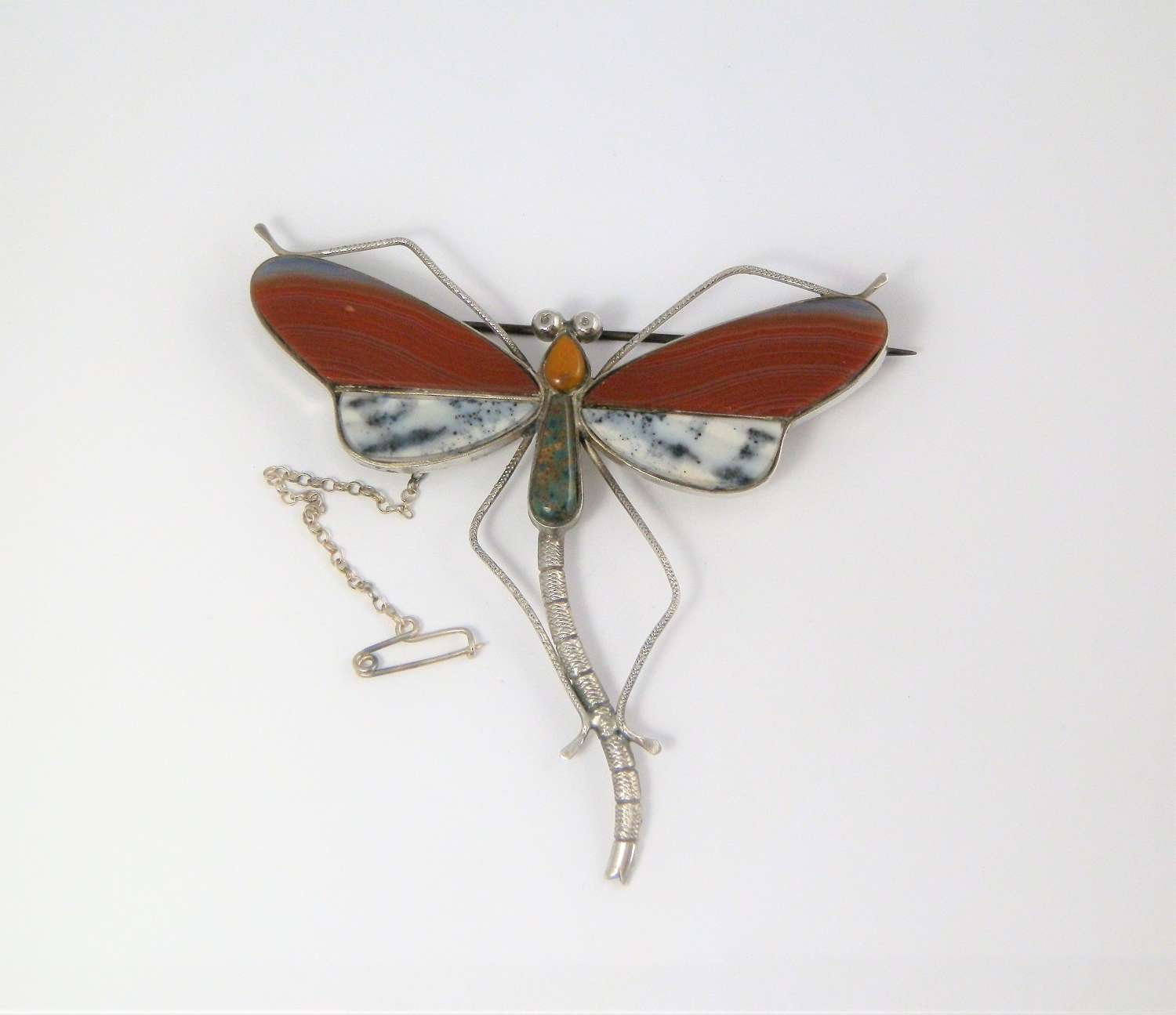A Victorian Scottish agate and silver dragonfly brooch.