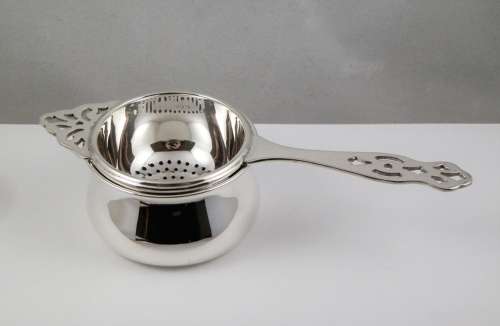 A rare Edward VIII silver tea strainer, Birmingham 1936