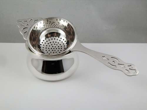 A rare Edward VIII silver tea strainer, Birmingham 1936