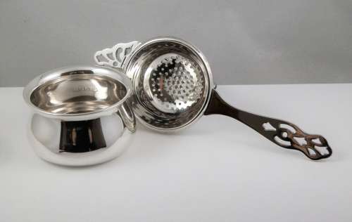 A rare Edward VIII silver tea strainer, Birmingham 1936