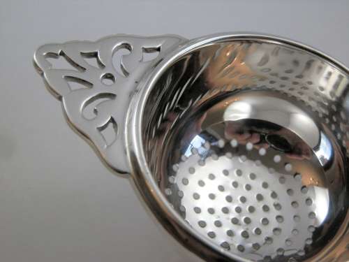 A rare Edward VIII silver tea strainer, Birmingham 1936