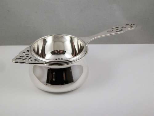 A rare Edward VIII silver tea strainer, Birmingham 1936