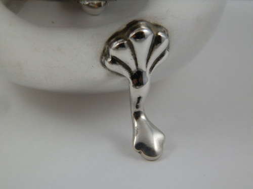 Elizabeth II silver two piece tea strainer, Birmingham 1962