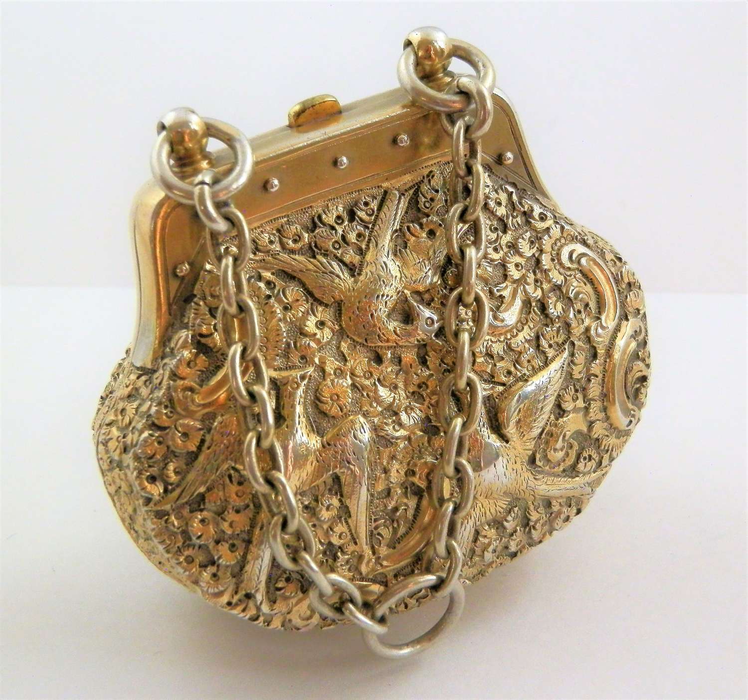 A Victorian silver gilt purse, Thomas Johnston, London 1874