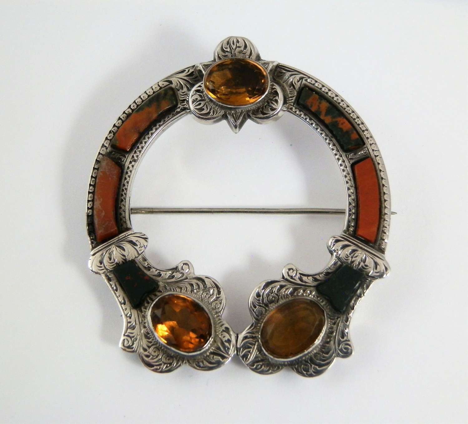 A Scottish Victorian silver agate penannular style brooch, c1880