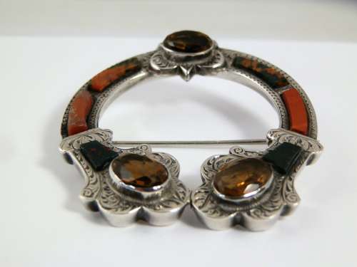 A Scottish Victorian silver agate penannular style brooch, c1880
