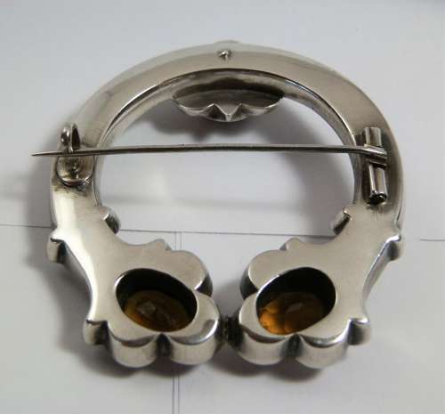A Scottish Victorian silver agate penannular style brooch, c1880