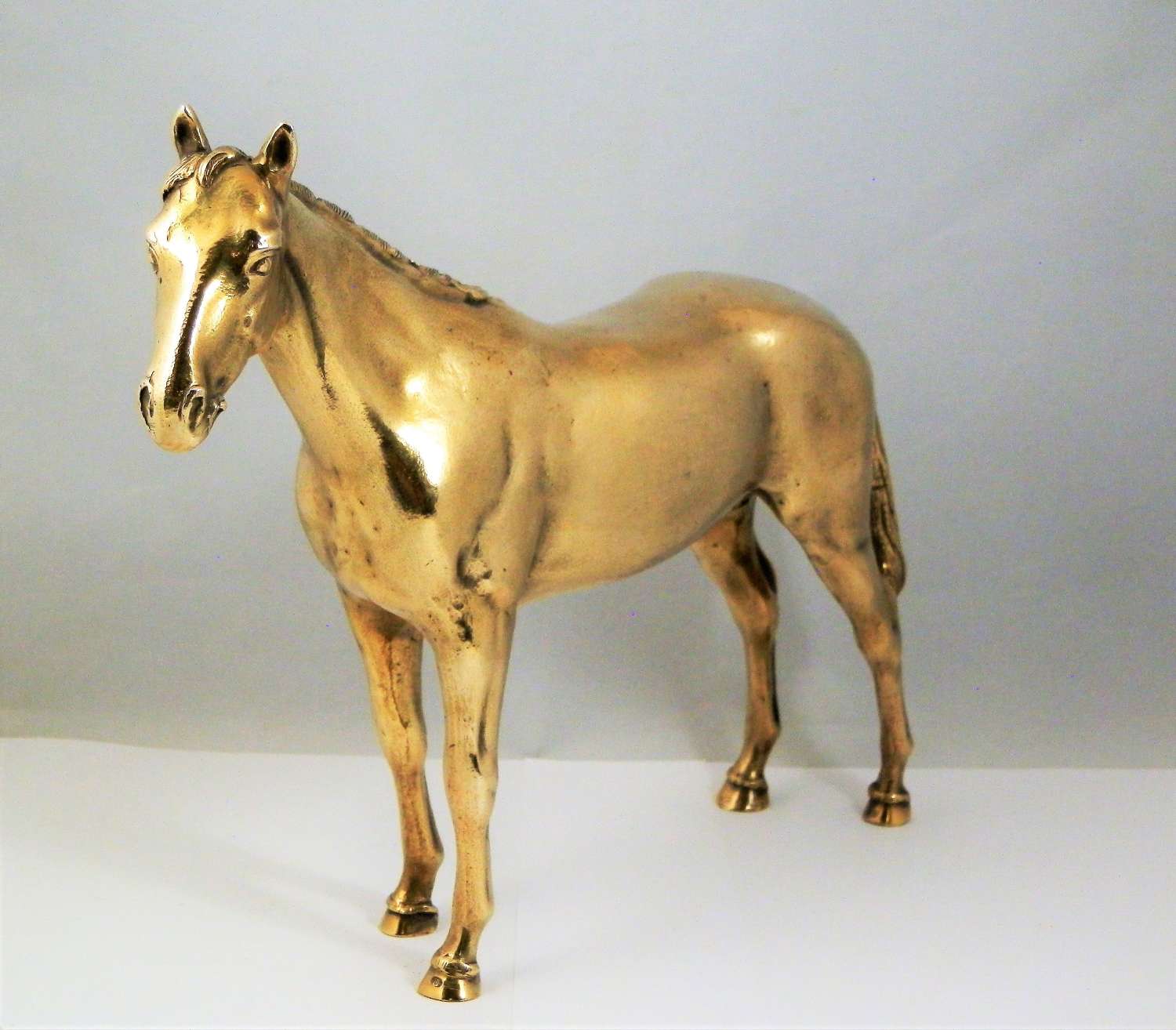 A silver gilt Italian statue of a race horse, Rome c.1970