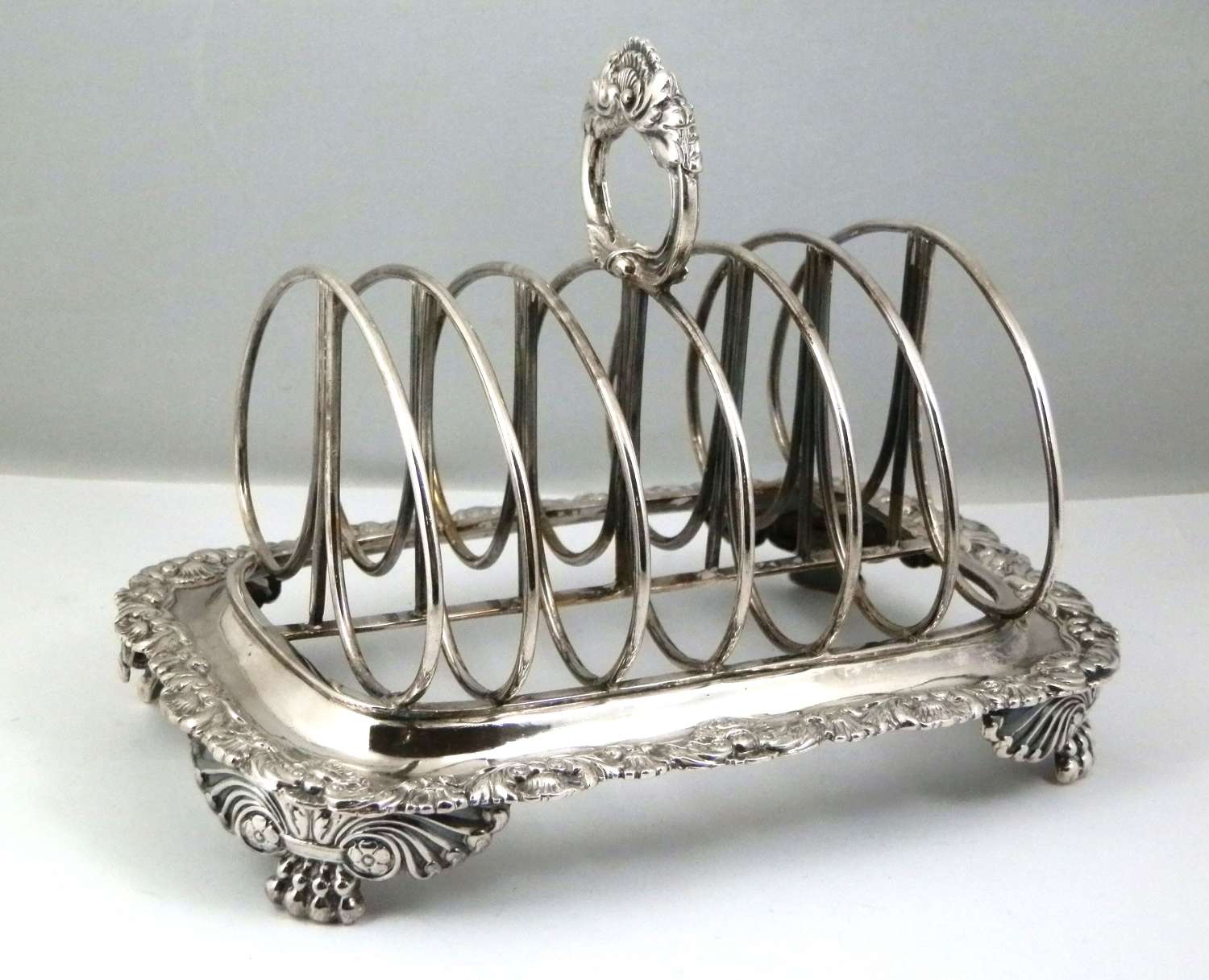 George IV silver ornate toast rack, Benjamin Smith, London 1827