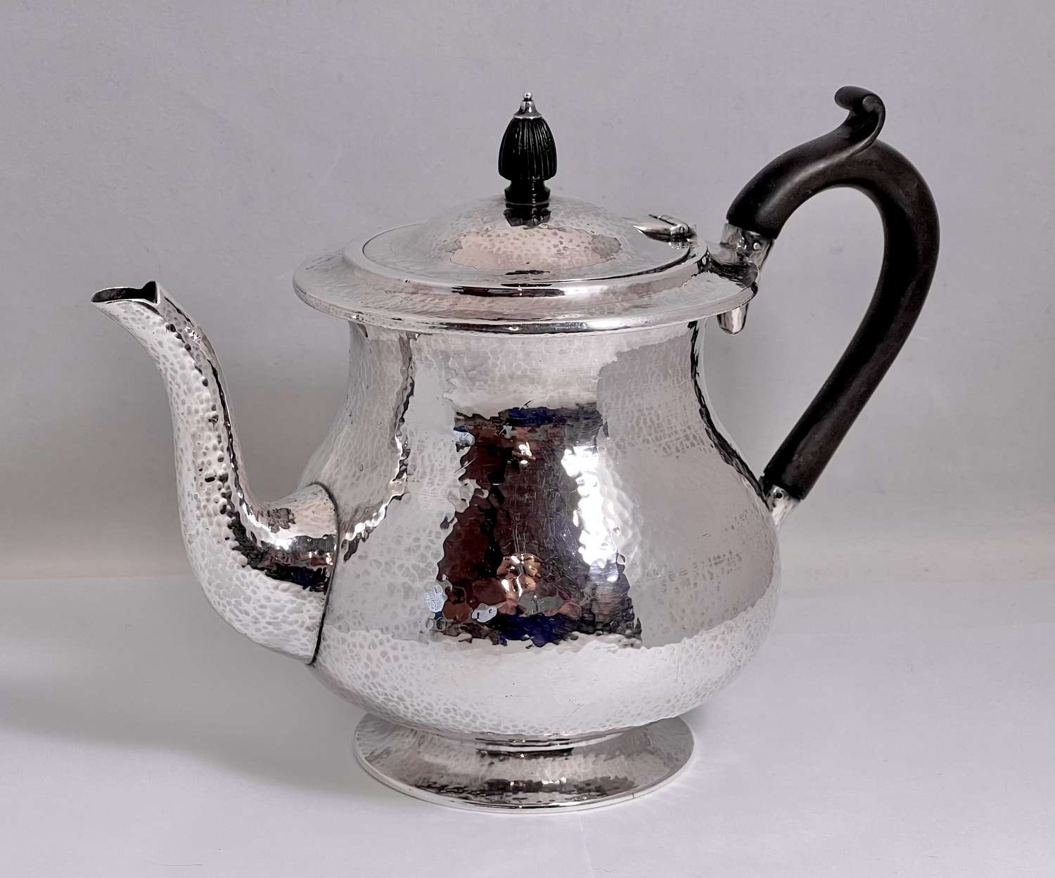 Arts and Crafts silver teapot by Sybil Dunlop, London 1930.