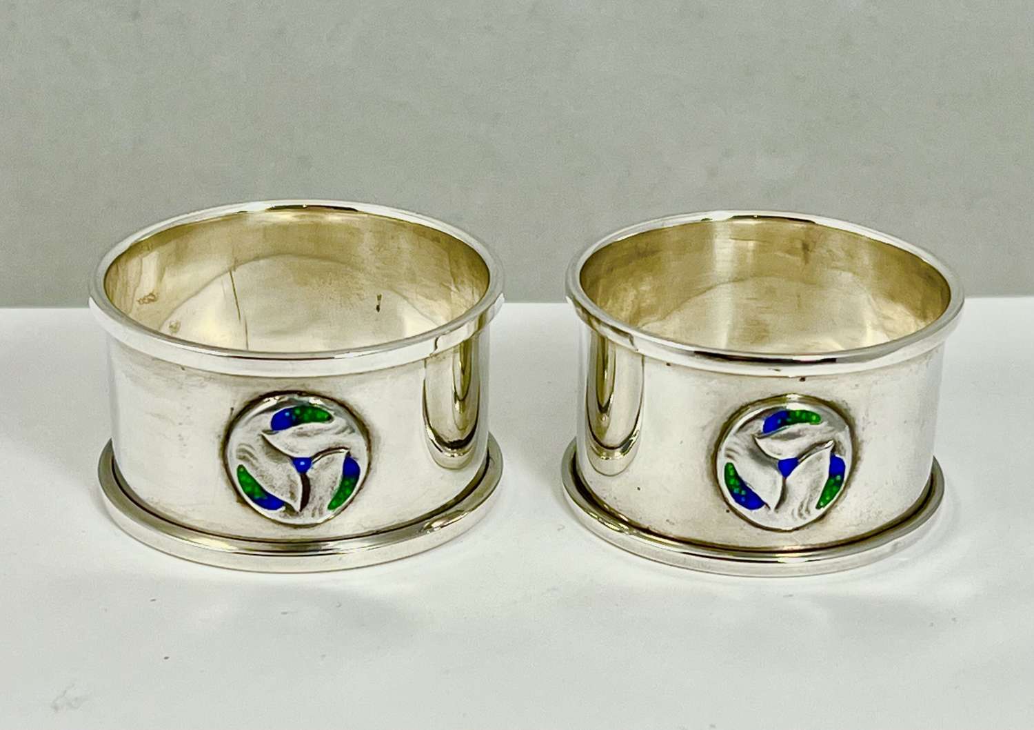 Art Nouveau silver and enamel pair of napkin rings by W.H.Haseler