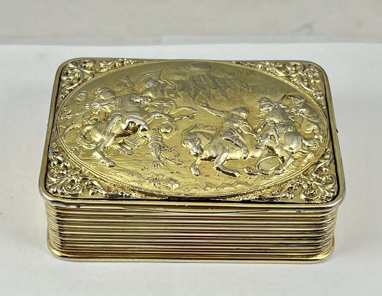 George III silver gilt table snuff box, Battle scene, London 1812