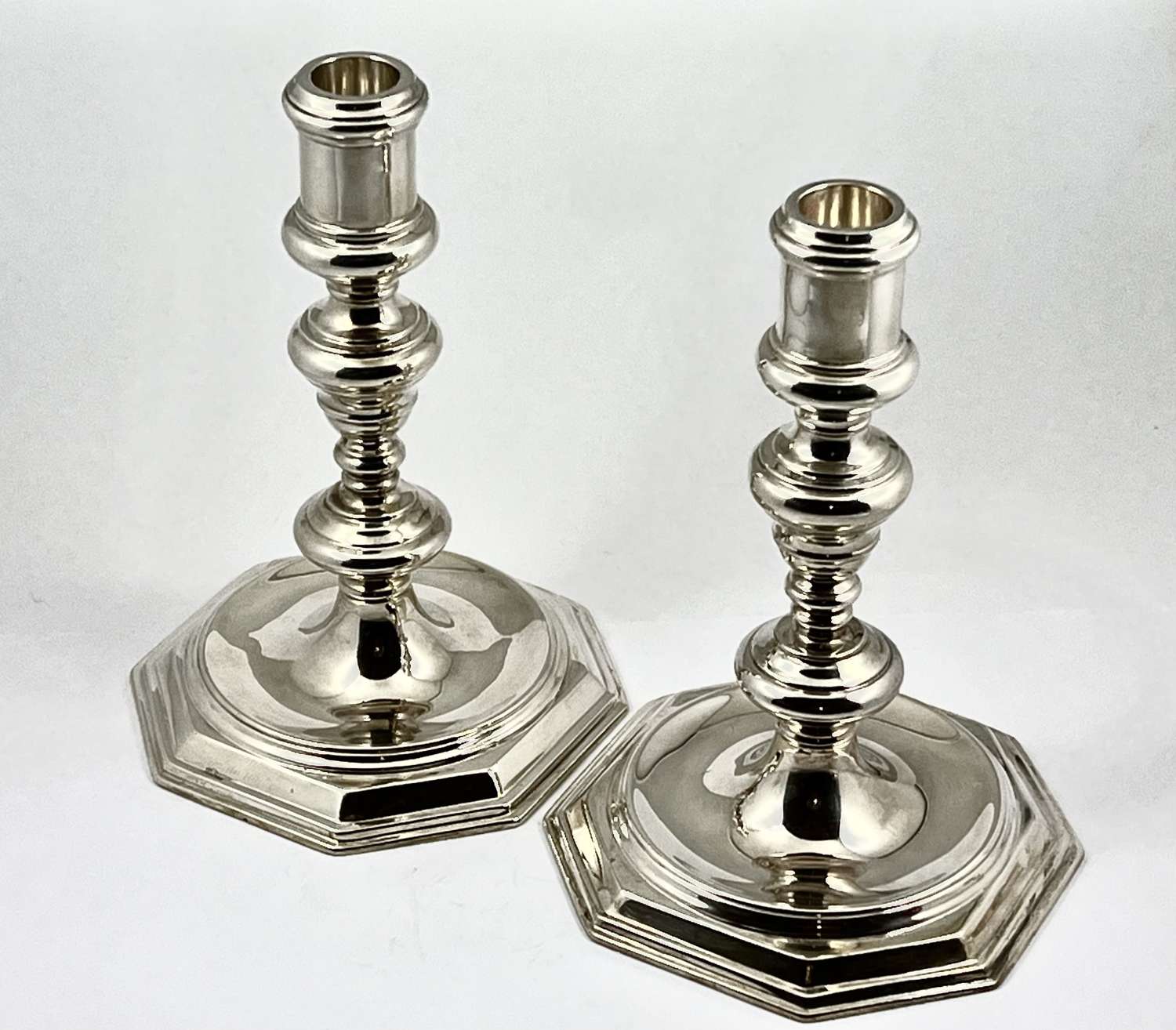 George VI matched pair of silver candlesticks, London 1931/52