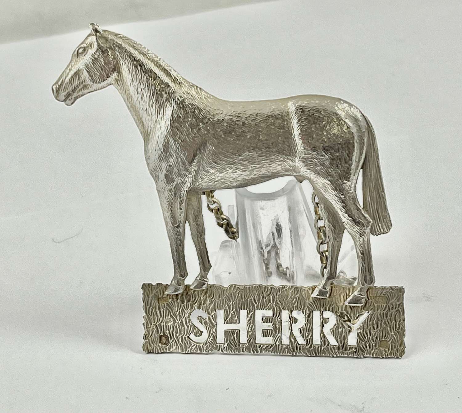 Elizabeth II silver “sherry” label, Mappin & Webb 1975