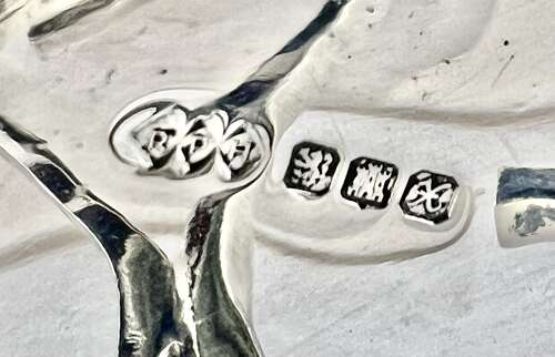 Elizabeth II pair of Scottish art nouveau silver candlesticks, Edinburgh 1997